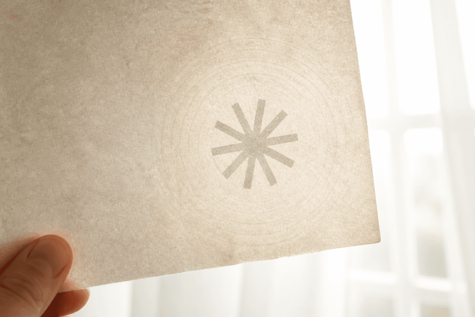 Claude invisible watermarks — backlit security paper metaphor